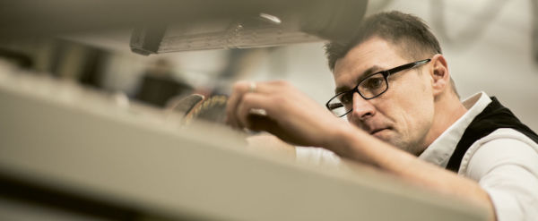 A photo of a woodworker using an Altendorf F45